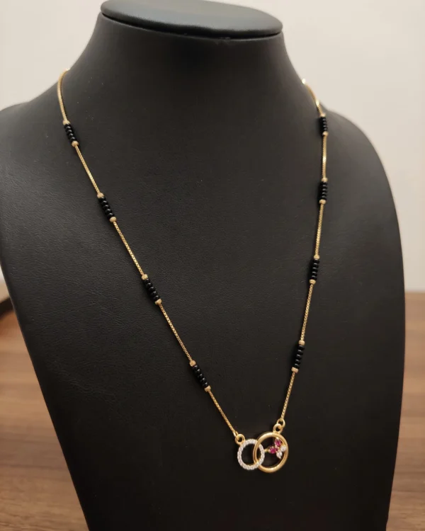 Interlocking Circle Black Bead Necklace