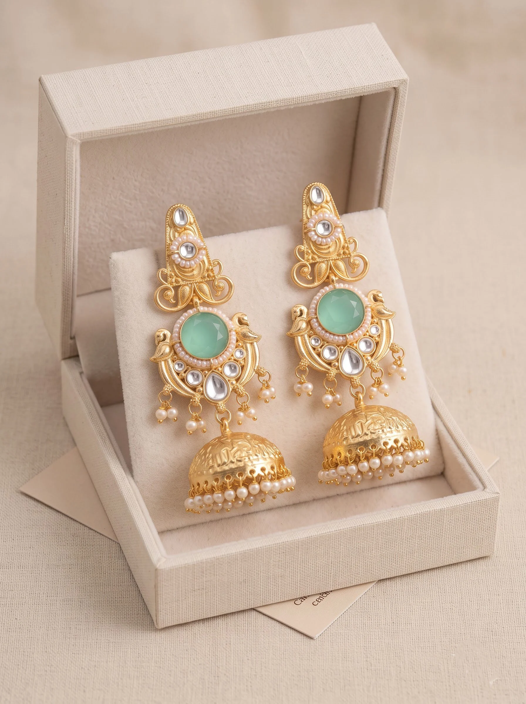 Green Stone Gold Jhumka Earrings